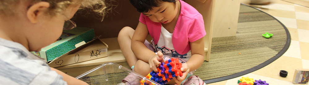 child playing with toy