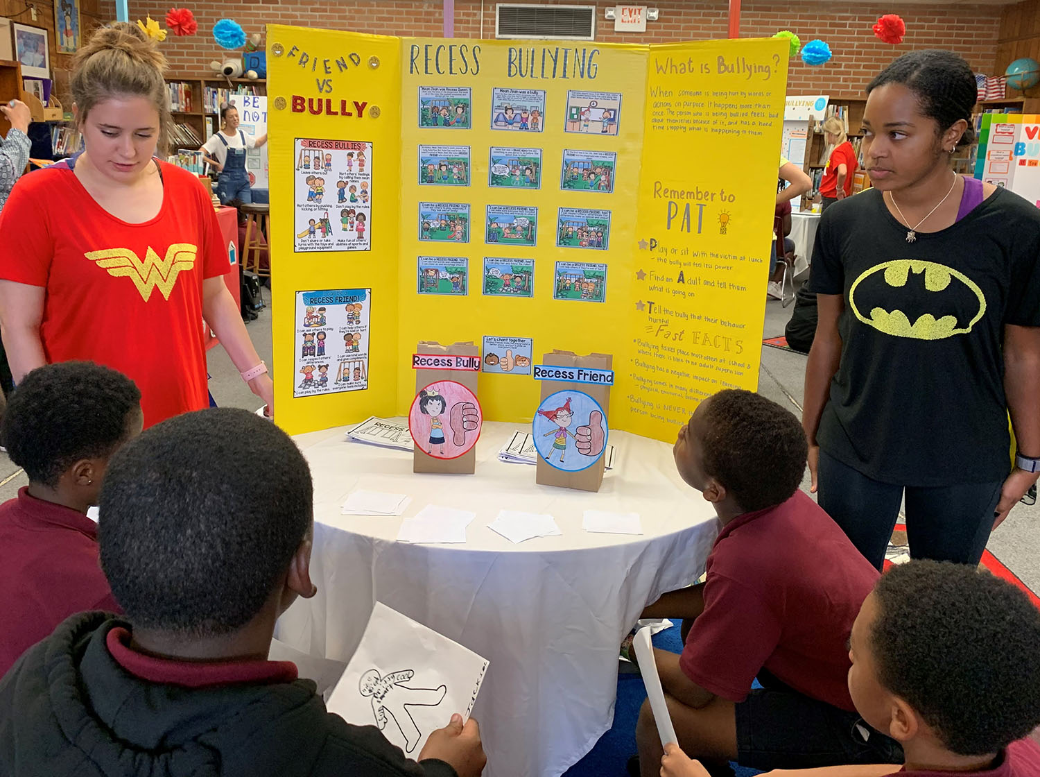 two LSU students present their bullying prevention lesson to elementary students