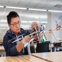 Student with robot